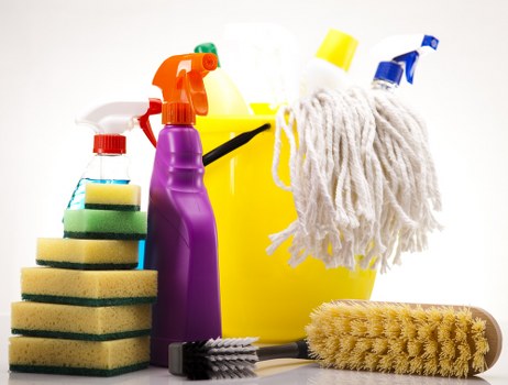 Local cleaner vacuuming and dusting in a South Kensington home